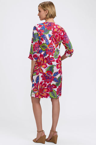 Back angle of model wearing the Vena Paradise Blooms Dress 