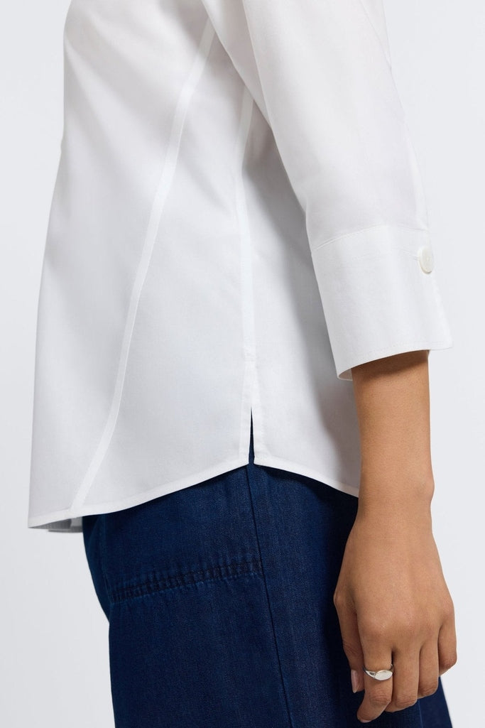 Close-up of the 3/4 sleeve on the Paityn shirt in #color_white