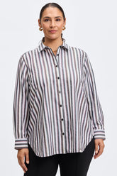 Plus-size woman wearing a striped, no-iron button-down shirt by Foxcroft, featuring a relaxed fit for effortless style and comfort.