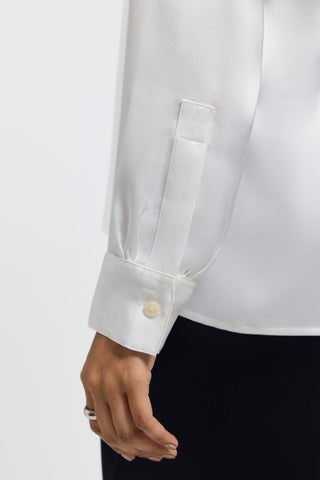 Buttoned cuff and sleeve of the Bianca beyond silk shirt #color_ecru