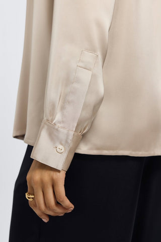 Buttoned cuff and sleeve of the Bianca beyond silk shirt #color_champagne