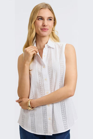 Woman in Foxcroft Ada sleeveless white eyelet shirt, breathable cotton with elegant texture