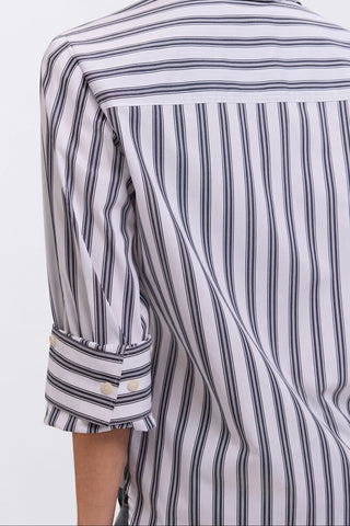 Back view of the Meghan Plus Striped Roll Tab Sleeve Shirt showing of the stripe-withing-a-strip pattern and the sleeves hitting just below the elbow 
