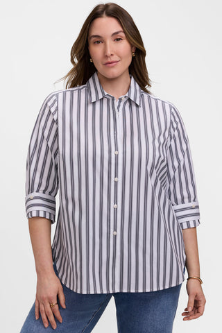 Front view of model wearing the Meghan Plus Striped Roll Tab Sleeve Shirt untucked for a more relaxed fit 