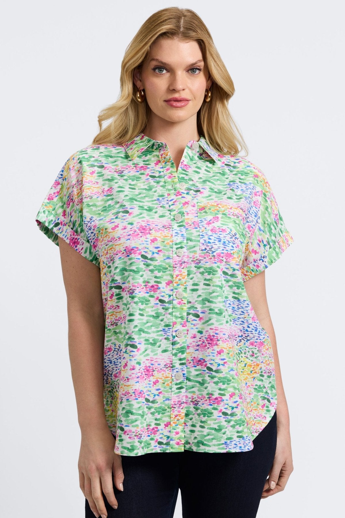 Woman in Foxcroft Abigail floral impression linen shirt, breezy fabric with bold floral accents