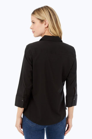 Back view of woman wearing the Mary No Iron Stretch 3/4 Sleeve Shirt #color_black