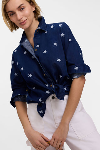 Model wearing the Meghan Tencel Star Embroidery Long Sleeve Shirt with the bottom tied up and sleeves pushed back 