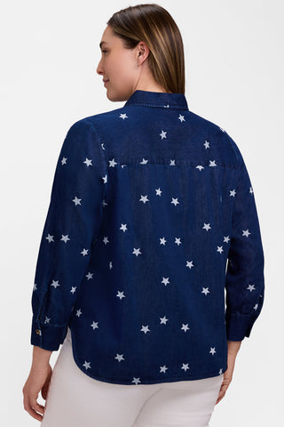 Back view of model wearing the Meghan Plus Tencel Star Embroidery Long Sleeve Shirt showing of the embroidered stars covering the shirt 