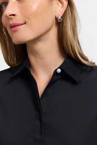 Close up of collar with single standout pearl of the Pearl Stretch Matte Sateen Long Sleeve Shirt #color_black