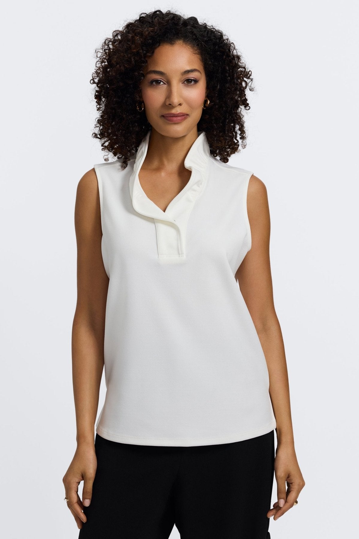 Woman in Foxcroft Tammy sleeveless knit crepe top in ecru
