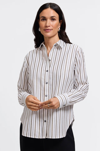 Front view of model wearing the Meghan Metallic Stripe Long Sleeve Shirt untucked with a pair of black pants 