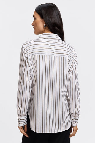 Back view of model wearing the Meghan Metallic Stripe Long Sleeve Shirt