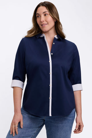 Front view of model wearing the Charlie Plus White Trim 3/4 Sleeve Shirt
with the cuffs folded back to show off the white contrast #color_navy