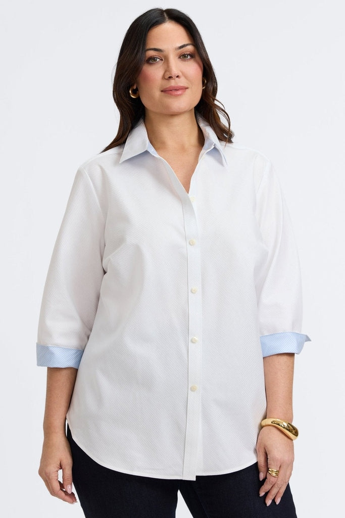 Plus-size woman in a white dooby stripe shirt from Foxcroft, soft and striking with a refined vibe.