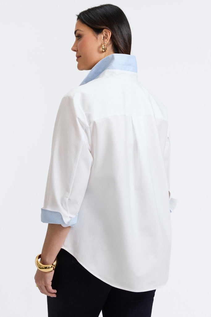Plus-size woman in a white dooby stripe shirt from Foxcroft, soft and striking with a refined vibe.
