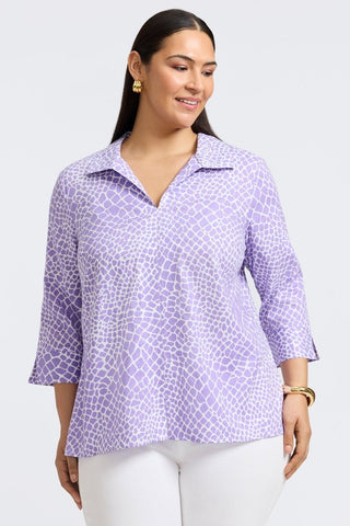 Woman wearing Foxcroft Agnes linen blouse in giraffe amethyst print