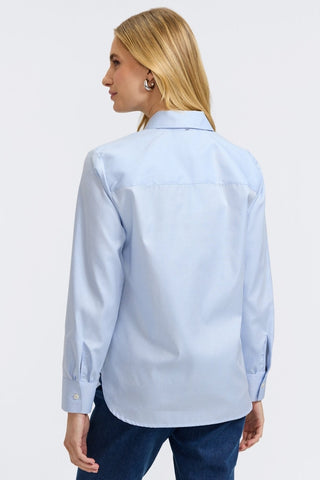 Back view of model wearing the Meghan Embroidered Long Sleeve Shirt