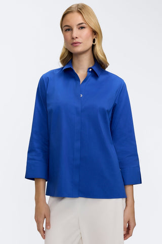 front view of the Beatrice Pearl Stretch Matte Sateen 3/4 Sleeve Shirt
worn untucked #color_deep sea