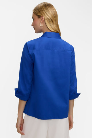 Back view of the Beatrice Pearl Stretch Matte Sateen 3/4 Sleeve Shirt worn untucked #color_deep sea