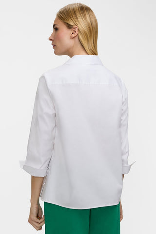 Back view of the Beatrice Pearl Stretch Matte Sateen 3/4 Sleeve Shirt worn untucked featuring the back yoke #color_white