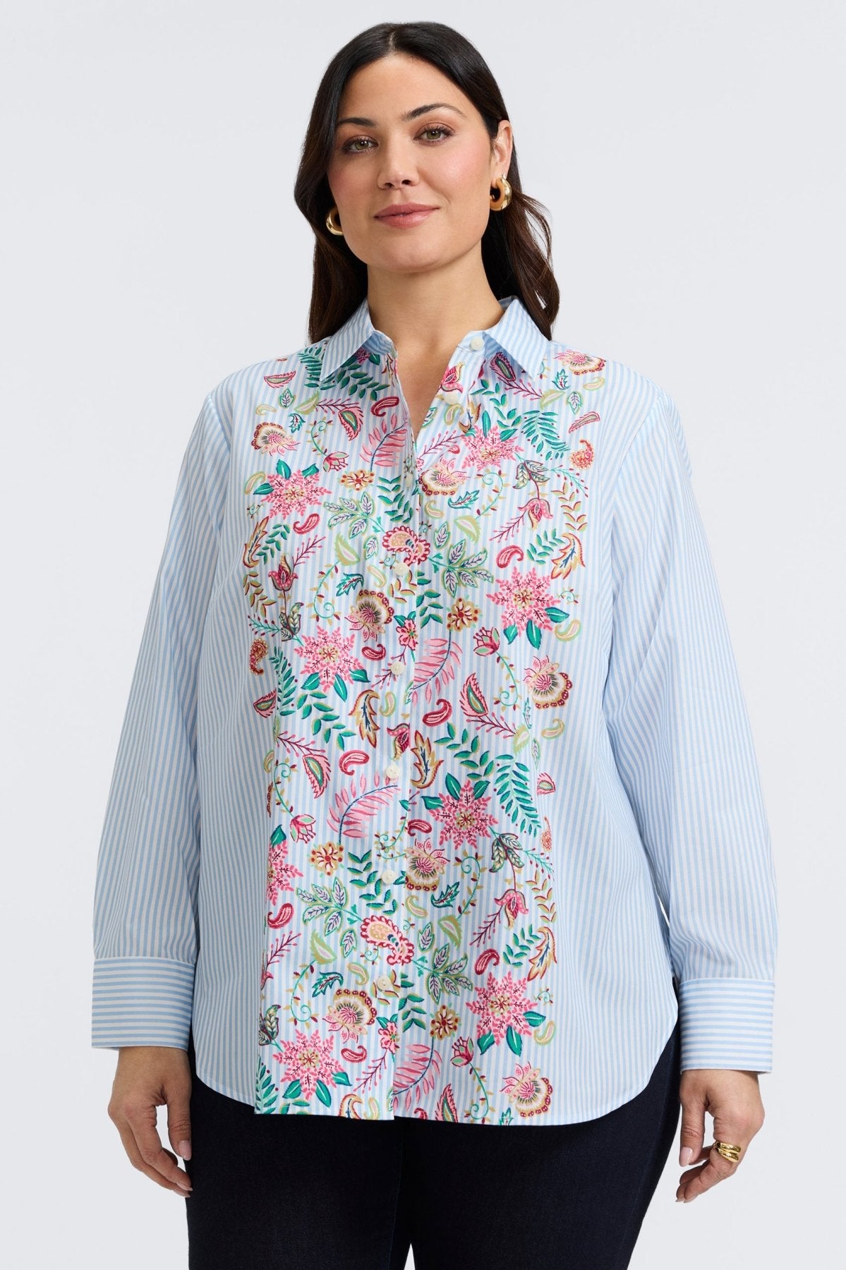 Plus-size woman in a blue floral stripe button-down from Foxcroft, offering cheerful sophistication with breathable ease. (9)