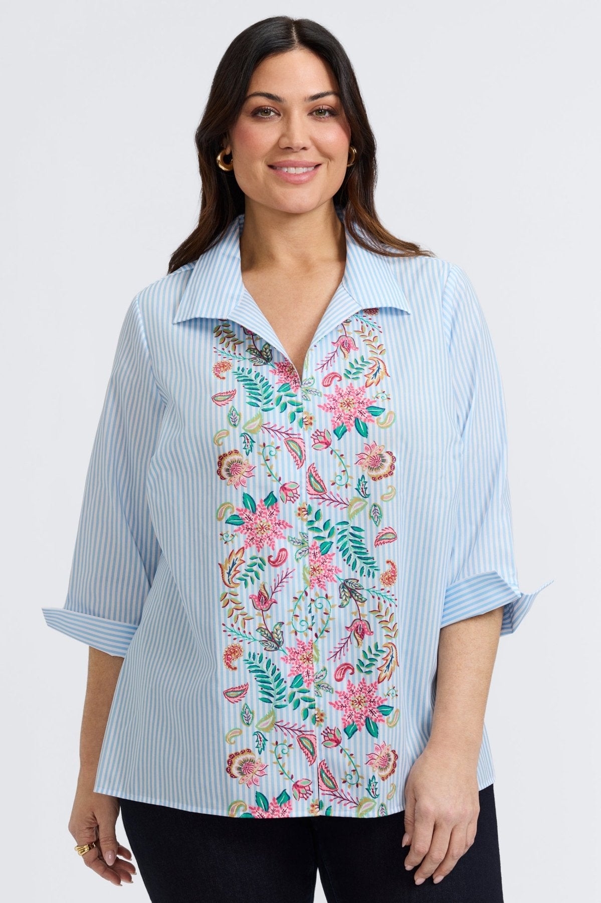 Plus-size woman in a blue floral stripe button-down from Foxcroft, offering cheerful sophistication with breathable ease. (8)
