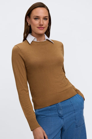 Model wearing the Taylor Knit-Woven Sleeveless Layering Tank underneath a brown sweater #color_white