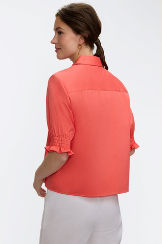 Angled back view of the Vivienne Stretch Matte Sateen Elbow Sleeve Shirt and it's shortened length #color_georgia peach