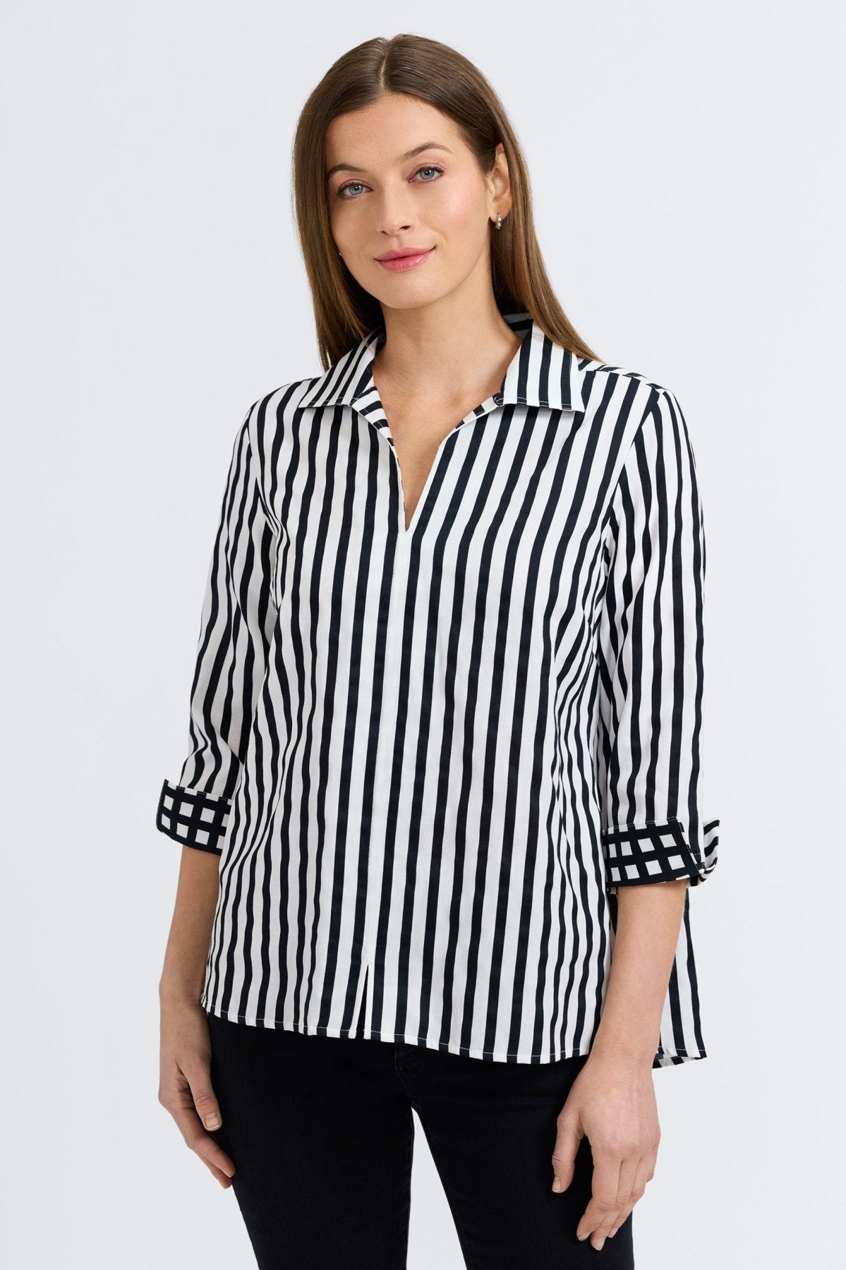 Woman wearing Foxcroft Agnes Black Stripe Gingham Border blouse, classic gingham detail with modern contrast.