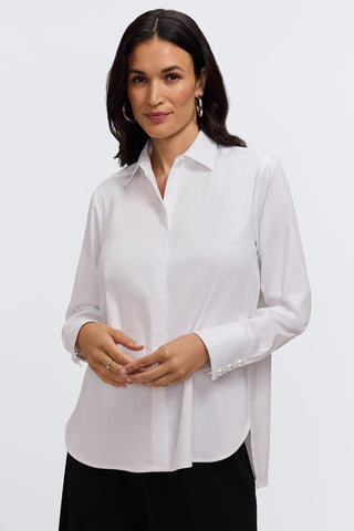 Front view of women with bent arms wearing Pearl Stretch Matte Sateen Long Sleeve Shirt #color_white