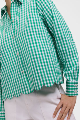 Angled front view of theScarlett Plus Gingham Stretch Matte Sateen Long Sleeve Shirt highlighting the scalloped hem #color_kelly green/white gingham