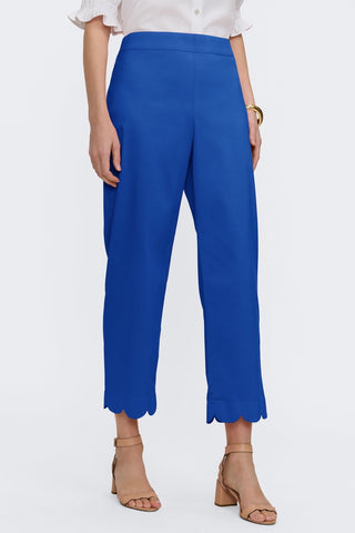 Waist down front view of the scalloped cuff satin capris #color_deep sea