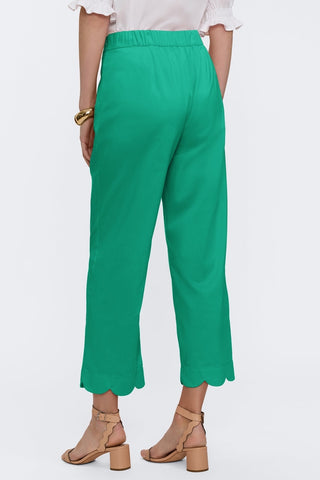 Back view of capris worn by model #color_kelly green