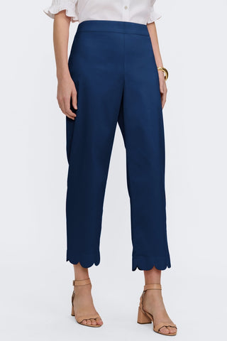 Angled front view of the scalloped cuff satin capris #color_navy