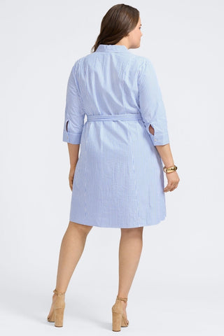 Plus-size woman in a blue double-stripe button-down shirt from Foxcroft, polished and practical with non-iron ease. (4)