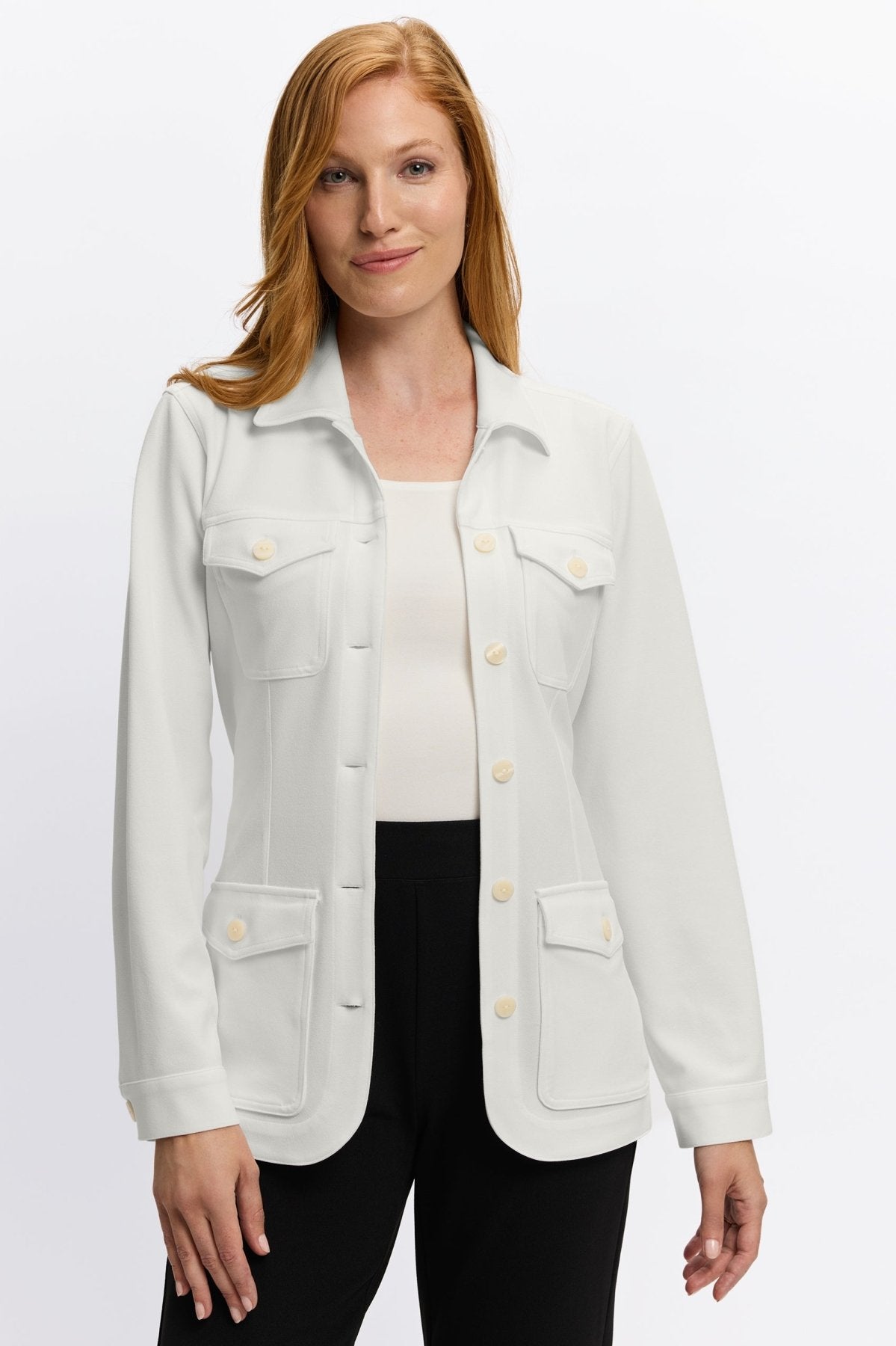 Woman in Foxcroft ecru button-down shirt with timeless versatility