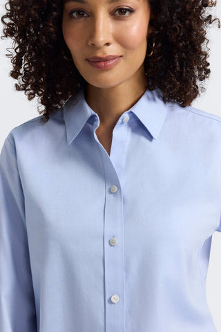 Close up front view of the collar and neckline of the Meghan No Iron Pinpoint Long Sleeve Shirt #color_blue wave 