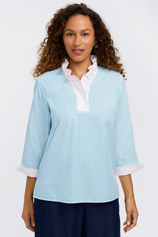 Front view of model wearing the striped 3/4 length sleeve shirt #color_capri pinpoint stripe