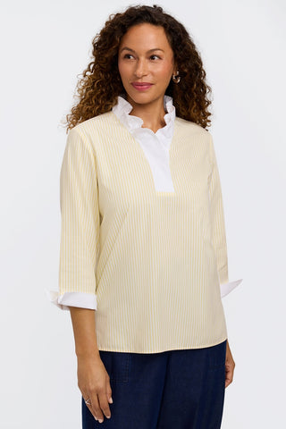 Model wearing the pinpoint striped popover shirt untucked #color_lemon pinpoint stripe