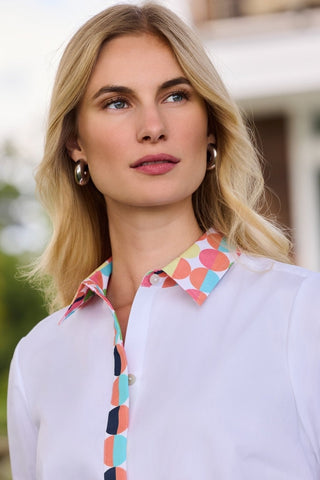Close up on the hidden placket and printed collar of the Luna Retro Dot 3/4 Sleeve Shirt