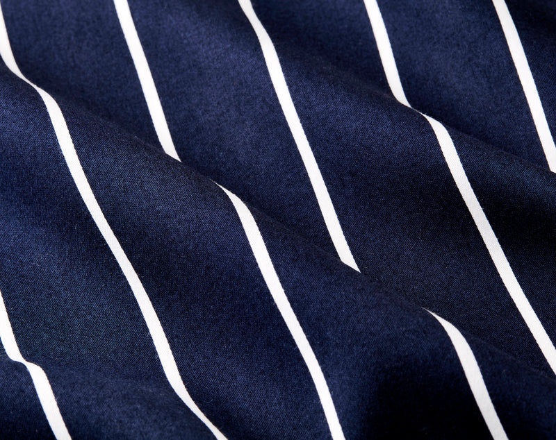 Close-up of Foxcroft cotton sateen fabric in rich blue tones