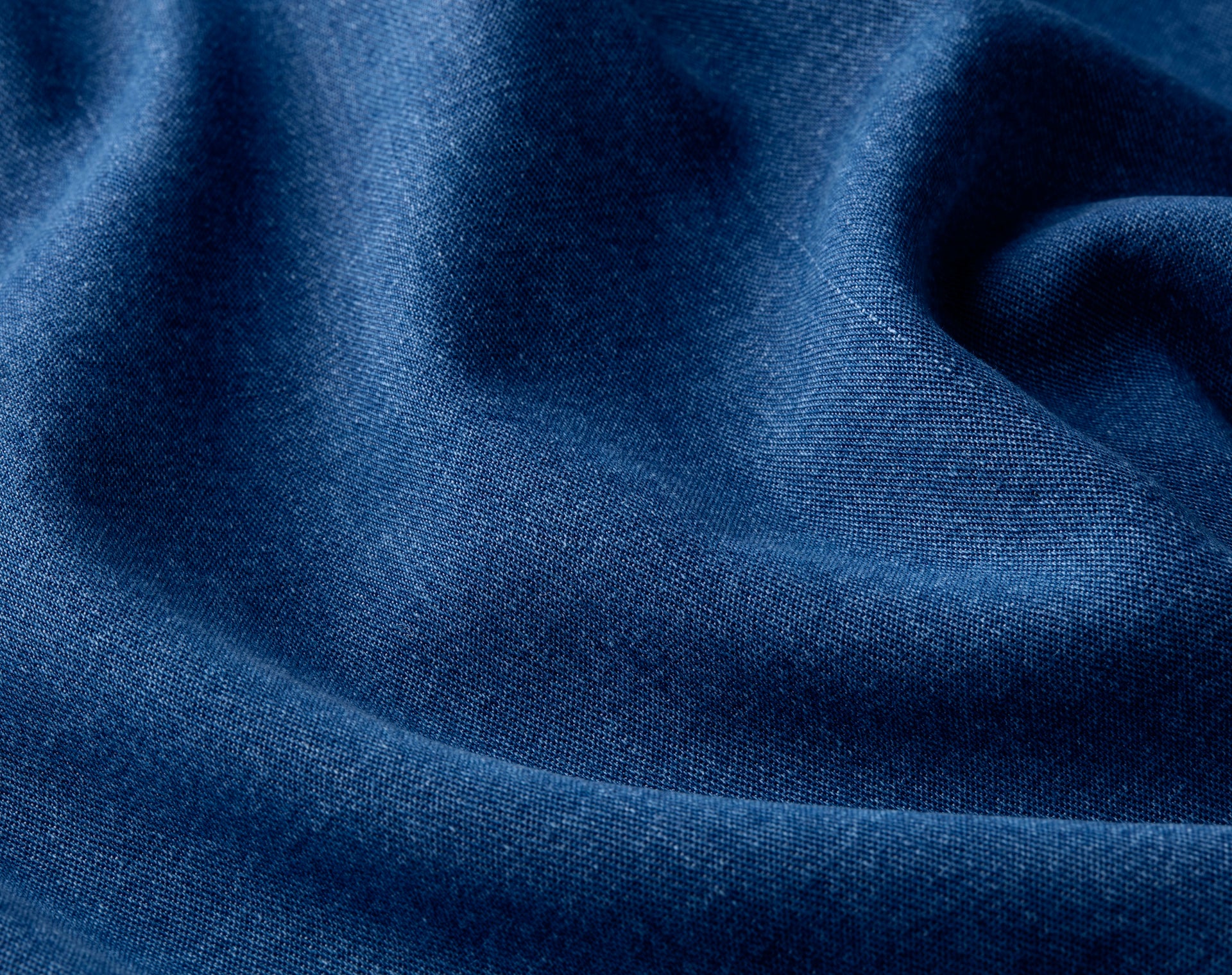 Zoomed-in texture of Foxcroft tencel denim fabric in soft indigo