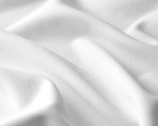 Close-up detail of Foxcroft knit crepe fabric showing lightweight drape