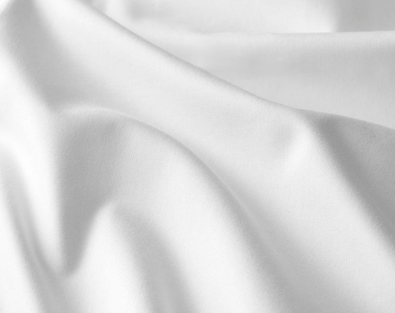 Stretch cotton fabric close-up showing breathable, flexible weave