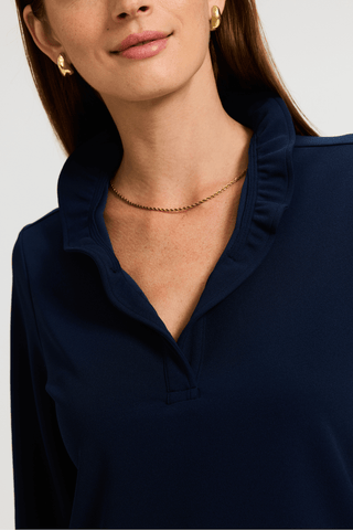 Close up on the ruffle v-neckline on the Tammy Knit Crepe 3/4 Sleeve Popover Shirt #color_navy